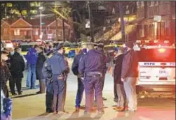  ??  ?? Police examine scene in Crown Heights, Brooklyn, Monday where a cop was stabbed as he responded to a dispute.