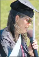 ??  ?? Gravette School District’s new superinten­dent, Maribel Childress, addresses the graduates and guests.