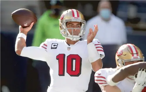  ?? SCOTT EKLUND/AP ?? Jimmy Garoppolo’s time with the 49ers could be coming to an end after the team traded up into a spot where it could draft one of the top quarterbac­ks.