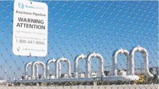  ?? NATI HARNIK/AP PHOTO ?? A pumping station sits ready in Steele City, Neb., to take oil from the planned Keystone XL pipeline but it may be some time yet before it is able to do so after the plan hit another legal setback this week.