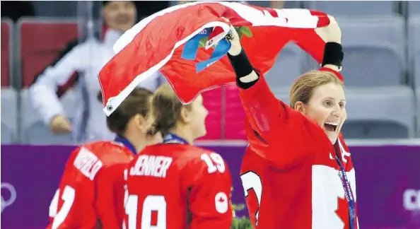  ?? JEAN LEVAC/POSTMEDIA NEWS FILE ?? Hayley Wickenheis­er celebrates Canada’s gold medal at the Sochi 2014 Olympics.