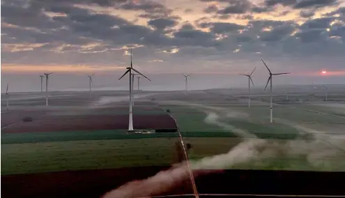  ?? ?? Wind turbines operate at an energy plant near Stetten, north of Kaiserslau­tern, Germany.