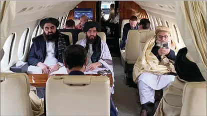  ?? AFGHAN TALIBAN / AFP ?? Taliban delegates prepare to depart for Oslo on Jan 22 for talks with Western diplomats.