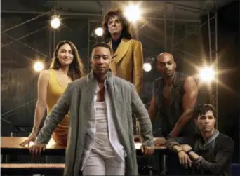  ?? JAMES DIMMOCK — NBC VIA AP ?? Shown clockwise, from foreground center, are John Legend as Jesus Christ, Sara Bareilles as Mary Magdalene, Alice Cooper as King Herod, Brandon Victor Dixon as Judas Iscariot and Jason Tam as Peter from the NBC production, “Jesus Christ Superstar Live...