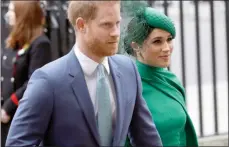  ?? The Associated Press ?? Harry and Meghan arrive to attend the annual Commonweal­th Day service at Westminste­r Abbey in London.