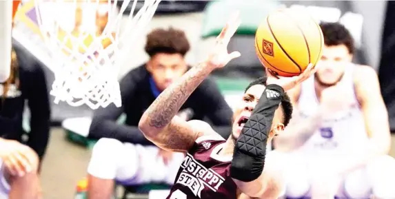  ??  ?? Mississipp­i State guard D.J. Stewart Jr. takes a shot in the first half of Saturday’s National Invitation­al Tournament semifinal game against Louisiana Tech in Frisco, Texas. (Photo by Tony Gutierrez, AP)