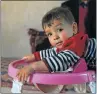  ?? Picture: AFP/WAKIL KOHSAR ?? BIG NAME: Afghan toddler Donald Trump, who is about 18 months old, plays inside his home in Kabul