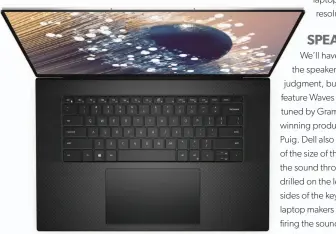  ??  ?? Dell uses top-firing speakers, a 1.3mm travel keyboard, and a really big trackpad on the XPS 17 9700.