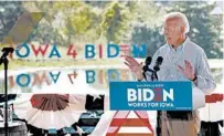  ?? CHARLIE NEIBERGALL/AP ?? During a campaign swing through Iowa on Tuesday, presidenti­al candidate Joe Biden reminded voters that the Obama administra­tion handed President Donald Trump a strong economy.