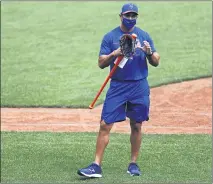  ??  ?? New York Mets manager Luis Rojas speaks during a July 3 workout at Citi Field in New York. Rojas and other first-year managers are scrambling to make up for lost time.