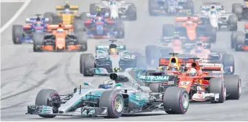  ??  ?? Mercedes’ Finnish driver Valtteri Bottas (front) drives after the start during the Formula One Austria Grand Prix at the Red Bull Ring in Spielberg. — AFP photo