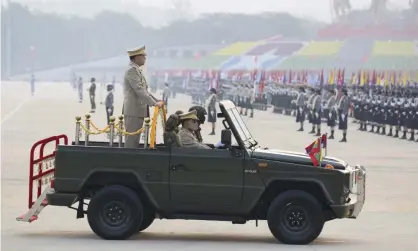  ?? Photograph: AP ?? Min Aung Hlaing, the head of the military junta, at an army parade in Naypyitaw, Myanmar, on 27 March.