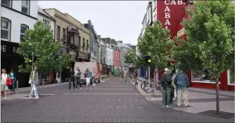  ??  ?? An artist’s impression of the planned ‘shared space’ semi pedestrian­ised area to be created in The Mall and Bridge St areas of Tralee. The plan also requires the return of two way traffic on Denny St.