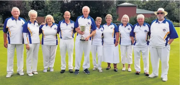  ??  ?? Loughborou­gh Phoenix with the Archie Peel Trophy which they secured with a victory against Queens Park last Saturday.