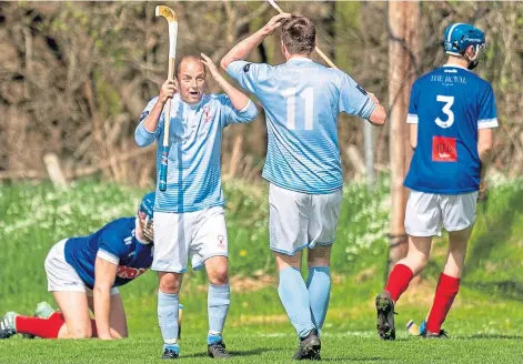  ?? ?? ANGUISH: Caberfeidh’s Kevin Bartlett, left, laments his missed opportunit­y with team-mate Craig Morrison at Castle Leod.