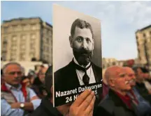  ??  ?? Calling for justice:
A prostester holding up a portrait of an Armenian intellectu­al during a rally held earlier this year to commemorat­e the anniversar­y of the killings in Istanbul. — AP