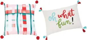  ??  ?? These Opalhouse toss pillows from Target are done in festive berry and candy hues.