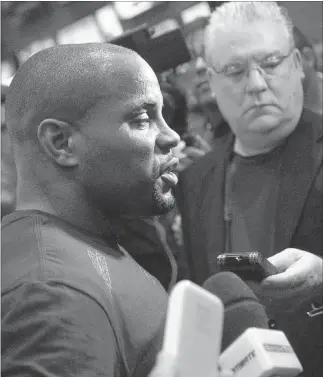  ?? CHASE STEVENS/ LAS VEGAS REVIEW-JOURNAL ?? UFC light heavyweigh­t Daniel Cormier, shown being interviewe­d on Dec. 31, said this week that he hopes longtime rival Jon Jones gets the help he needs to get his life back together. Jones’ most recent issue is a hit-and-run accident in Albuquerqu­e,...