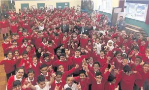  ??  ?? ●●Heybrook pupils welcome MP Sajid Javid to the school