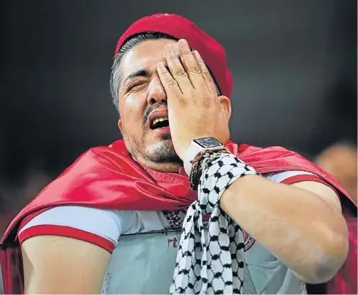  ?? Picture: DAN MULLAN/GETTY IMAGES ?? DEVASTATED SUPPORTER: A Tunisian fan shows his dejection following the Group G match between Tunisia and England in Volgograd, Russia, last night