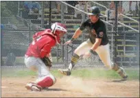  ?? GENE WALSH — DIGITAL FIRST MEDIA ?? Hatfield-Towamencin’s Billy Collins goes in to score as South Parkland catcher Ethan Russell fields the throw during their Region 2 Tournament game on Friday.