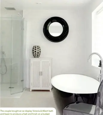  ??  ?? The couple bought an ex-display Victoria &amp; Albert bath and basin to produce a high end finish on a budget