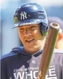  ?? BUTCH DILL/USA TODAY SPORTS ?? Austin Romine, likely the backup catcher for the Yankees, gets ready for batting practice.