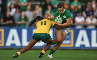  ??  ?? Katie Fitzhenry is tackled by Australia’s Mahalia Murphy in the 2017 World Cup clash in Belfield, Dublin.