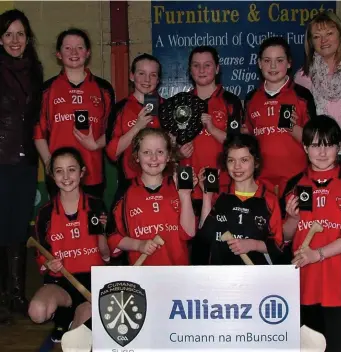  ??  ?? Ballintogh­er won the Indoor Camogie final with Dromore West in the Teeling Centre.