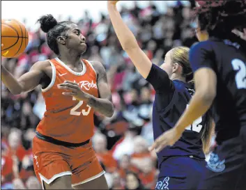  ?? ?? Lady Rebels center Desi-rae Young led all scorers Saturday with 23 points, shooting 8-for-16 to go along with 12 rebounds, four assists, four steals and a block.