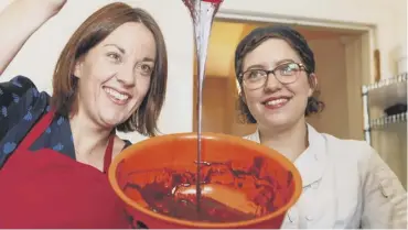  ??  ?? Kezia Dugdale indulges herself in a little chocolate making on the campaign trail in Edinburgh