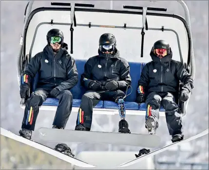  ?? ?? Romanian athletes taking part in the Paralympic Games use a ropeway at Genting Resort Secret Garden.