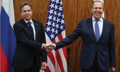  ?? Photograph: Anadolu Agency/Getty ?? The US secretary of state, Antony Blinken (left), and the Russian foreign minister, Sergei Lavrov, meet in Geneva, Switzerlan­d.