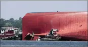  ?? STEPHEN B. MORTON — THE ASSOCIATED PRESS ?? Rescuers work near the stern of the Golden Ray Monday.