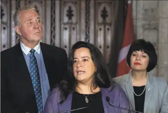  ?? Justin Tang / Canadian Press ?? Justice Minister Jody Wilson-Raybould, with Minister of Health Ginette Petitpas Taylor (right) and Parliament­ary Secretary Bill Blair, announces that cannabis will be legal in Canada Oct. 17.