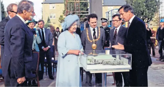  ??  ?? Her Majesty Queen Elizabeth the Queen Mother inspecting the architectu­ral model of the new building for the University Library in October 1986. Read more at the top of the left-hand column. Picture: University of Dundee Archive Services.