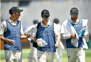  ?? PHOTOSPORT ?? Perth water boys Trent Boult, left, Todd Astle and Tom Blundell all have a chance of playing in the Boxing Day test at the MCG.