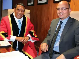  ?? Photo: Michelle Pienaar ?? George Mayor Melvin Naik and Municipal Manager Trevor Botha, in Council last year, shortly after they received the good news from National Treasury that their request for the roll-over of R47,2-million was granted for the upgrade of the Nelson Mandela...