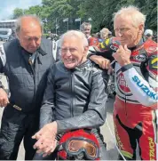  ?? ?? Kings on two and four wheels. L-R: Grand Prix driver Jochen Mass, Sammy Miller, Kevin Schwantz.