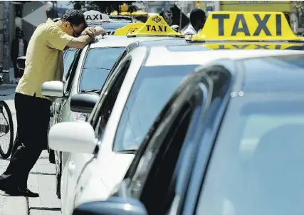  ?? Tyler Anderson / National Post files ?? Writer Michael Motala says the beneficiar­ies of the current taxi system are the cab licensees who collect rents on their highly valued municipall­y backed imprimatur at the consumer’s expense.