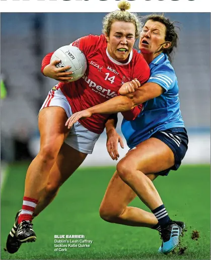  ?? ?? BLUE BARRIER: Dublin’s Leah Caffrey tackles Katie Quirke of Cork