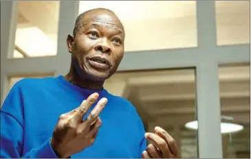  ?? AFP ?? Burkinabe architect Diebedo Francis Kere during an interview in his office in Berlin, Germany, on Tuesday after being awarded the 2022 Pritzker Architectu­re Prize.