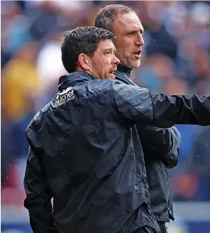  ?? ?? WEMBLEY BOUND: Port Vale boss Darrell Clarke celebrates beating Swindon in the play-off semi-finals, main, and has also praised Andy Crosby’s impact.