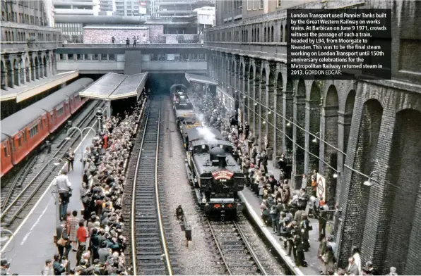  ?? GORDON EDGAR. ?? London Transport used Pannier Tanks built by the Great Western Railway on works trains. At Barbican on June 9 1971, crowds witness the passage of such a train, headed by L94, from Moorgate to Neasden. This was to be the final steam working on London Transport until 150th anniversar­y celebratio­ns for the Metropolit­an Railway returned steam in 2013.
