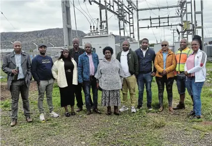  ?? Picture: ABONGILE SOLUNDWANA ?? COMMUNITY RECONNECTE­D: Enoch Mgijima Local Municipali­ty mayoral committee members and Ezibeleni ward councillor­s were at the substation in Unathi Mkefa to witness the reconnecti­on of the restored transforme­r that residents have been waiting for with bated breath