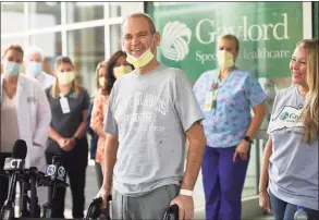  ?? Brian A. Pounds / Hearst Connecticu­t Media ?? Florida resident Robby Walker smiles as he leaves Gaylord Hospital Wednesday after receiving COVID-19 treatment.