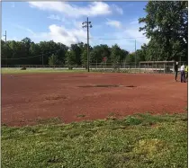  ?? RICHARD PAYERCHIN — THE MORNING JOURNAL ?? The Parks and Recreation grounds crew of Lorain’s Public Property Department ponders their next move at Field 2, a ball diamond at Oakwood Park in South Lorain, on Sept. 7, 2017.