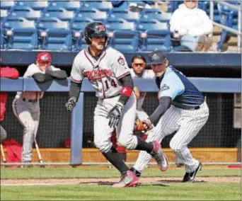  ?? JOHN BLAINE — FOR THE TRENTONIAN ?? Thunder third baseman Mandy Alvarez, right, tags out Richmond’s Aramis Garcia after Garcia got in a rundown during Sunday afternoon’s game at Arm & Hammer Park.