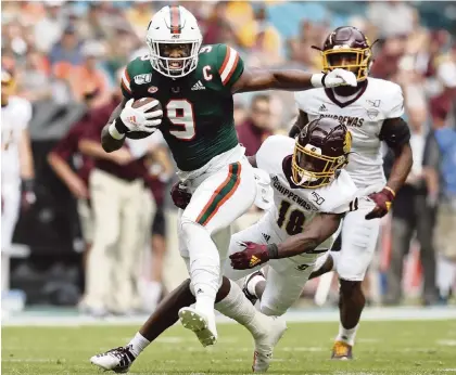  ?? AL DIAZ adiaz@miamiheral­d.com ?? UM junior Brevin Jordan was one of three finalists for the 2019 Mackey Award that goes to the top tight end in the nation. His mother Beverly says ‘Most kids his age are optimistic. They think everything is going to be back to normal in no time. For Brevin, there is not life without football.’