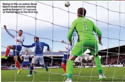  ??  ?? Rising to the occasion: Dean Shiels heads home winning goal in Rangers’ 2-1 success at Palmerston in the first leg